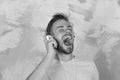 Musical lifestyle. European man have fun time. American handsome bearded guy with headphones. Royalty Free Stock Photo