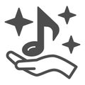 musical note on palm with shiny stars solid icon, music concept, eighth note in hand vector sign on white background Royalty Free Stock Photo