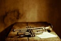 Musical notes under an ancient jazz trumpet