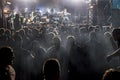 Musical Rock Concert. Silhouettes of a concert crowd of people fans shows a goat Royalty Free Stock Photo