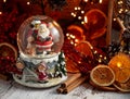 Musical Snow Globe with Santa Claus on bokeh background Royalty Free Stock Photo