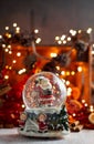 Musical Snow Globe with Santa Claus on bokeh background Royalty Free Stock Photo