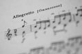 Musical tempo Allegretto in a music book Royalty Free Stock Photo