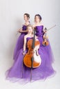 Musical trio in evening gowns Royalty Free Stock Photo