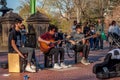 Musician band playing and singing. People watching and listening.