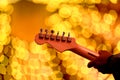 Musician cited hand held guitar. Royalty Free Stock Photo