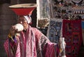 Inca descendent Musician playing a seashell horn Chinchero market Cusco Peru UNESCO world heritage city Royalty Free Stock Photo