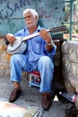 A musician entertains tourists at Kaleici in Antalya in Turkey.