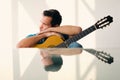 Musician With Guitar Feeling Uninspired And Lacking Creativity Royalty Free Stock Photo