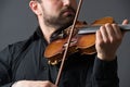 Musician man playing the violin. Musical instrument on performer Royalty Free Stock Photo