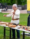 Musician man plying sopilka ethnic woodwind musical flute family instrument. Music festival in Lviv, Ukraine May 14 2022 Royalty Free Stock Photo