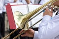 Musician of military orchestra plays his trombone Royalty Free Stock Photo