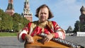 Musician with music instrument gusli, Russia