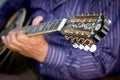 Musician and music instrument. Royalty Free Stock Photo