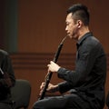 musician performs English horn on wind music chamber music concert