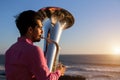 Musician play to Tuba on romantic sea shore. Concert. Royalty Free Stock Photo