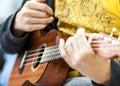 Musician playing acoustic guitar at a private party Royalty Free Stock Photo