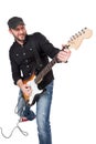 Musician playing electric guitar with enthusiasm. Isolated on white Royalty Free Stock Photo