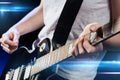 Musician playing electric guitar with mediator Royalty Free Stock Photo