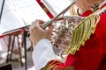 Musician playing french horn in street orchestra Royalty Free Stock Photo