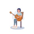 Musician playing guitar. Happy young woman guitarist with musical acoustic instrument. woman holding acoustic guitar