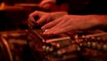 Musician playing lap steel, pedal guitar, slide guitar on stage.