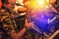 Musician playing the saxophone on band