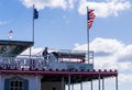 Musician playing steam calliope on paddle boat on Mississippi river Royalty Free Stock Photo