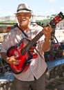 Musician playing for tourists in Havana