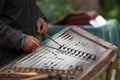 Musician playing traditional hammered dulcimer Royalty Free Stock Photo