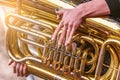 Musician playing tuba.