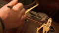 Musician playing on violancello in the orchestra