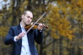 Musician playing at violin