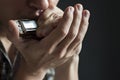 Musician plays the harmonica Royalty Free Stock Photo