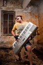 Musician plays a synthesizer Royalty Free Stock Photo