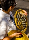 Musician plays the woodwind musical instrument horn Royalty Free Stock Photo