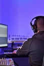 Musician, producer with headphones working in the studio Royalty Free Stock Photo