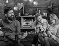 Musician putting all heart into his art. Bearded man singing passionately love song. Girls enjoying touching performance Royalty Free Stock Photo