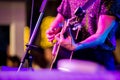 Musician`s hands playing guitar at a live show on stage Royalty Free Stock Photo