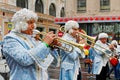 Musicians dressed in 18th-century clothes with a trumpet on City Day on Tverskaya Street in Moscow