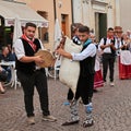 Musicians of folk ensemble Irizema from Bova Marina, Calabria, Italy, play tarantella with tambourine and zampogna Royalty Free Stock Photo