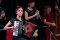 Musicians with the London Klezmer Quartet playing klezmer music during a faculty concert at the Klezfest music festival, London UK