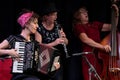 Musicians with the London Klezmer Quartet playing klezmer music during a faculty concert at the Klezfest music festival, London UK