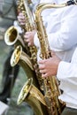 Musicians of military orchestra plays saxophones Royalty Free Stock Photo