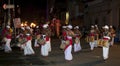 Musicians perform along the streets of Kandy during the Esala Perahera in Kandy, Sri Lanka.