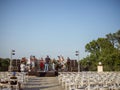 Musicians performing classic instrumental music on outdoor stage