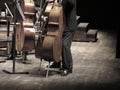 Musicians playing Cello music instruments on stage in concert hall Royalty Free Stock Photo