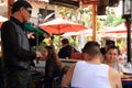 Musicians playing music while people enjoy lunch, Old Town, San Diego, California, 2016