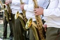 Musicians playing the saxophones in military orchestra Royalty Free Stock Photo