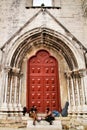 Musicians resting at the door of Convento do Carmo in Lisbon Royalty Free Stock Photo